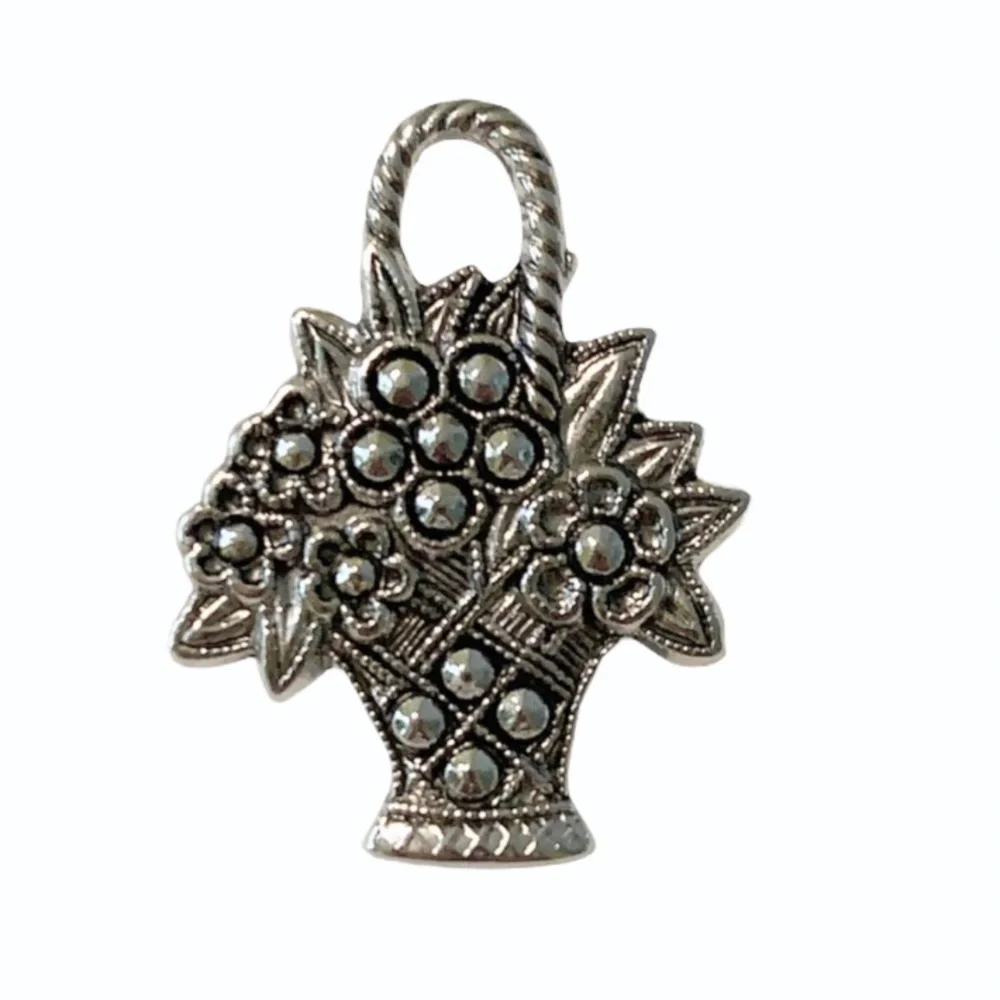 Vintage Avon silver flower basket pin